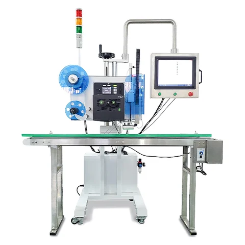 NBS real-time print and apply labelling system with conveyor